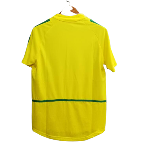 Brazil 2002 World Cup kit season at best price. Shop now your retro football kits in Glamour Soccer Store. Original quality and printing.